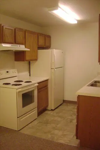 Meadowlands apartments kitchen with refrigerator