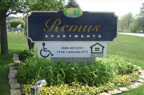 Remus Apartments Sign and extrior