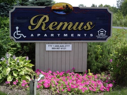 Remus Apartments Sign