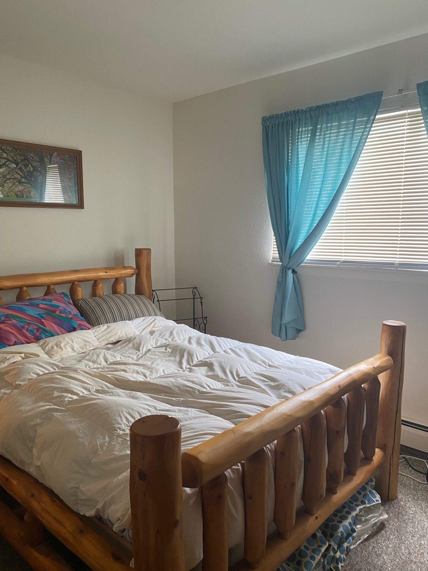 Ridgeview apartments bedroom with blue curtains