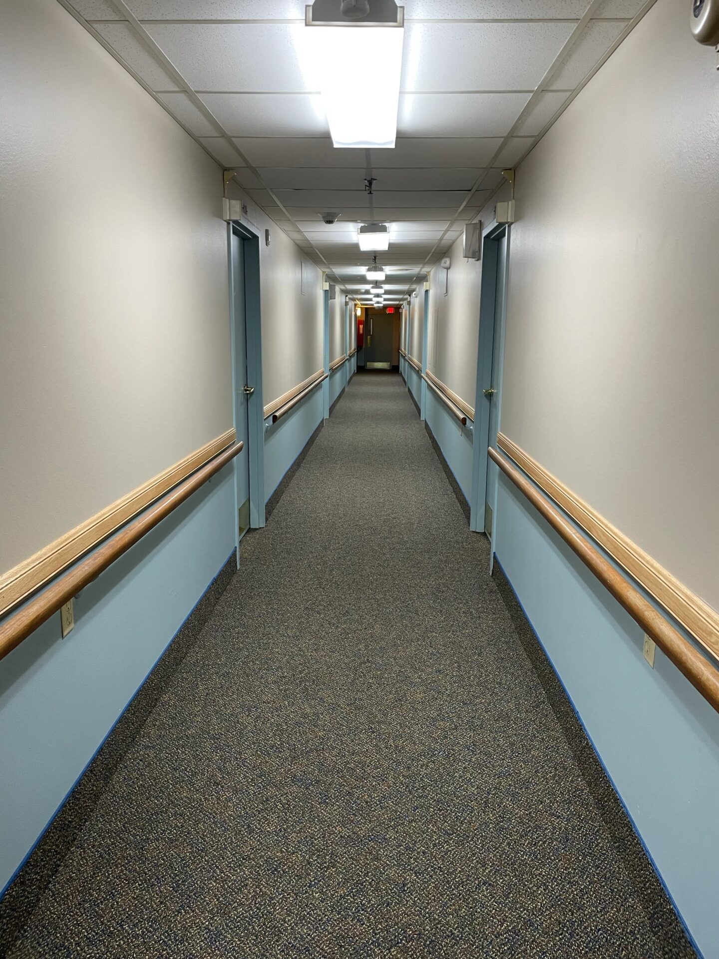 Pine Oak Apartments interior corridor and doors